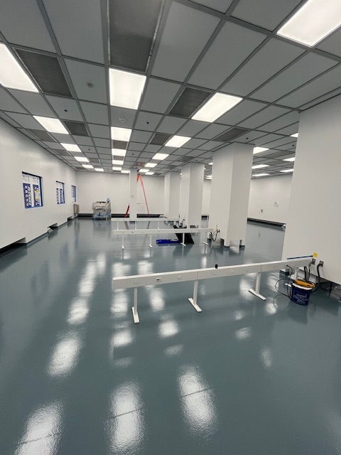 Completed Maydus controlled environment with sealed ceiling grid, integrated lighting and seamless resin flooring